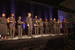 Photo of W. Crimm Singers on stage during their performance to open NFG's National Convening.